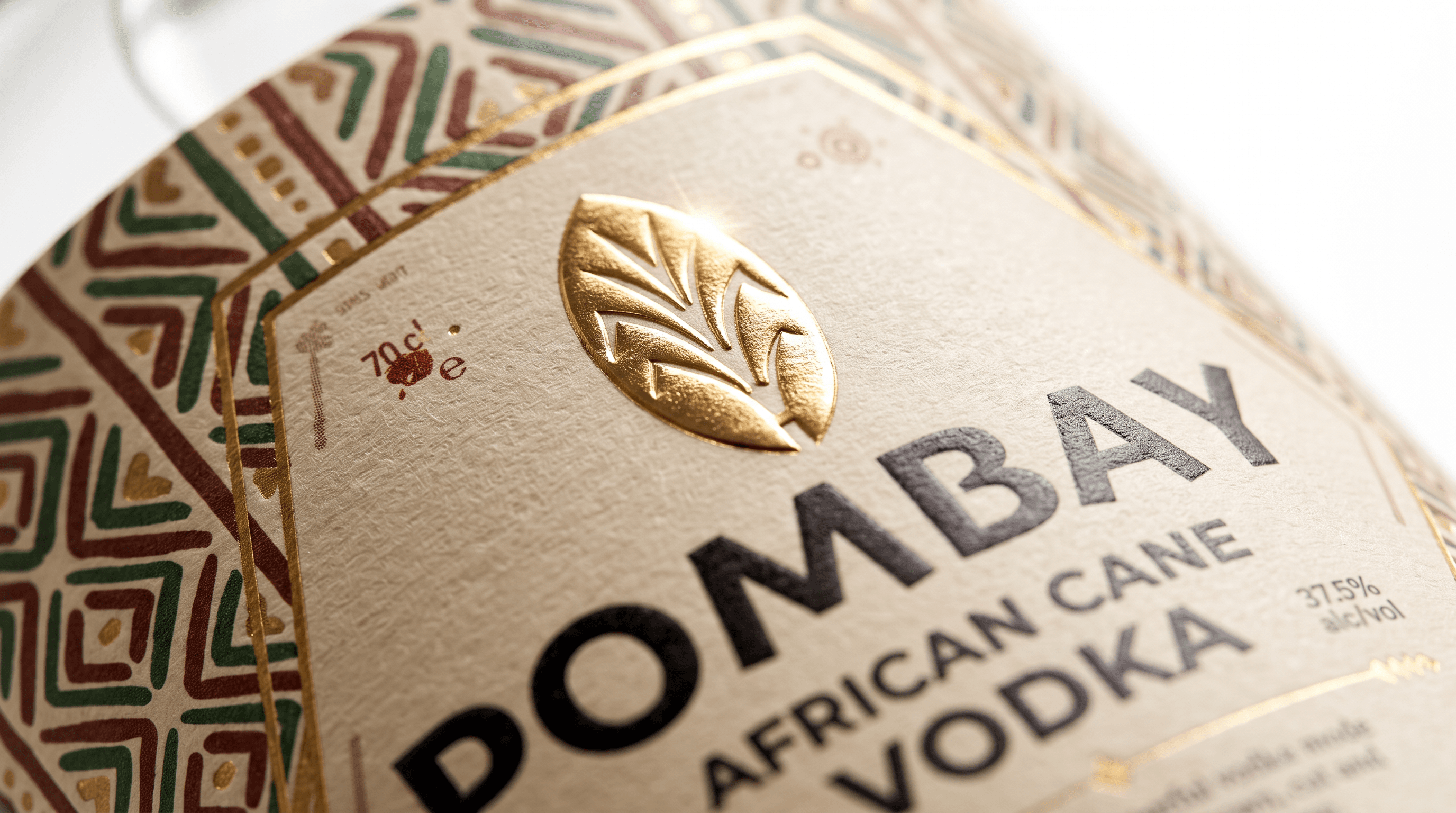 The gold cane emblem on the finished Pombay Cane Vodka label